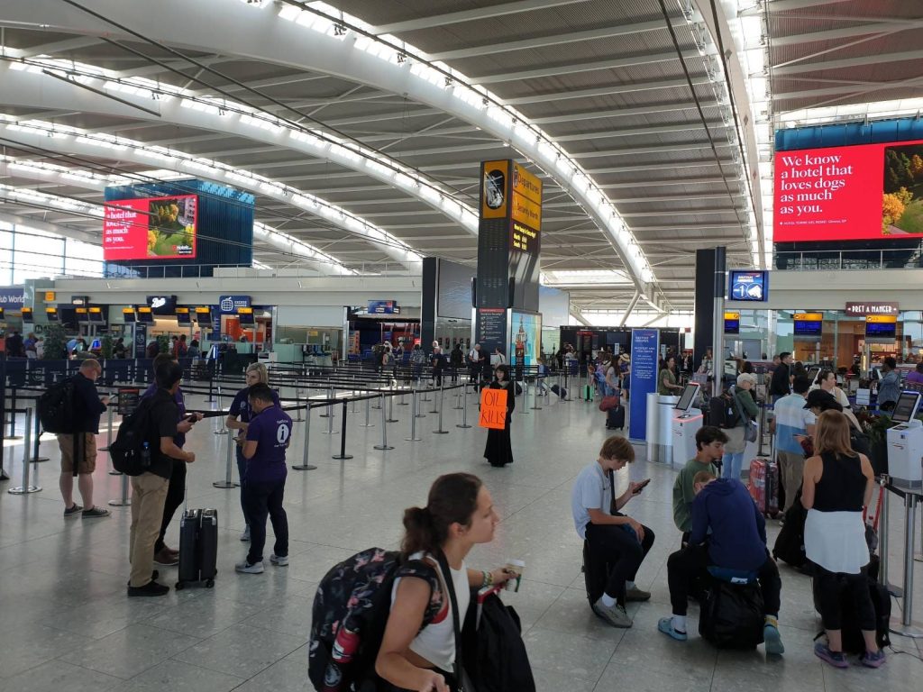 Just Stop Oil supporter detained and forcibly removed from Heathrow for ...